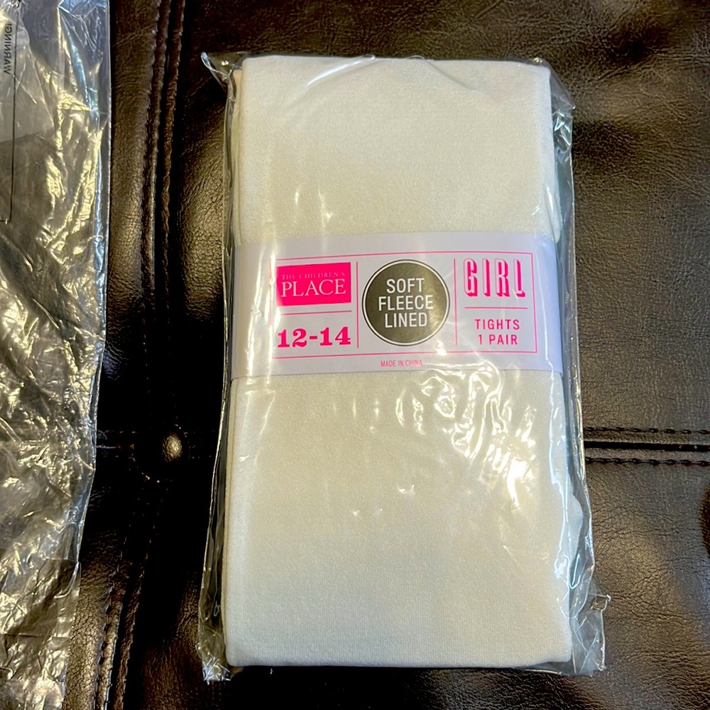 The children’s palace, soft fleece lined tights, size 12 to 14. White